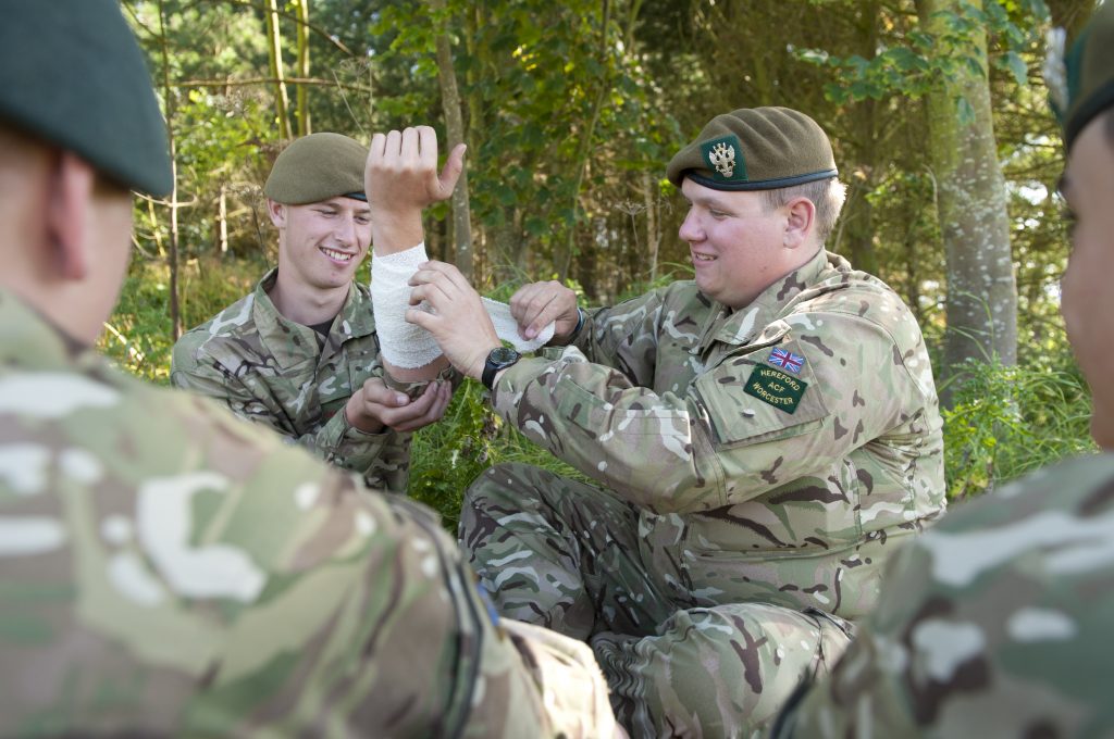 Cadets practicing first aid