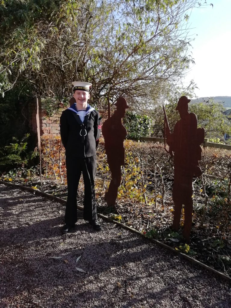 Able Cadet Nathaniel with remembrance cutouts