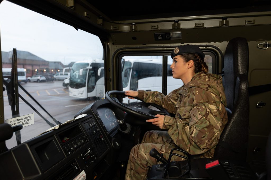 Senior Aircraftman (SAC) Caitlin Boudewyn, a Royal Air Force Reservist, driving in the MT section at Lossiemouth.