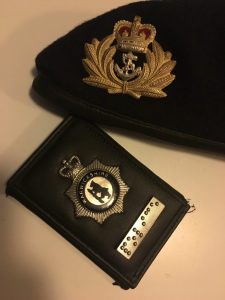 Beret and badge