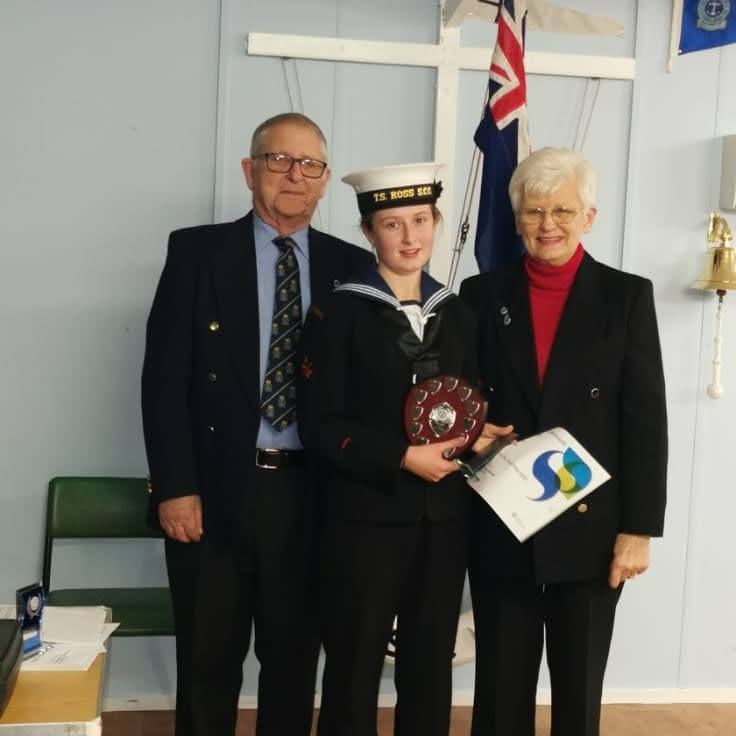 OC Bella receiving an award at her unit