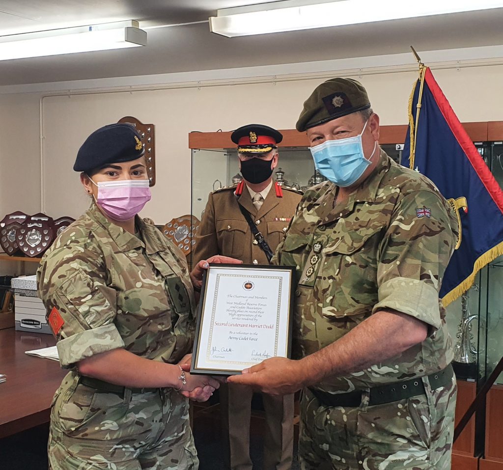 Staffordshire Army Cadet Force Volunteer 2Lt Dodd receives her certificate