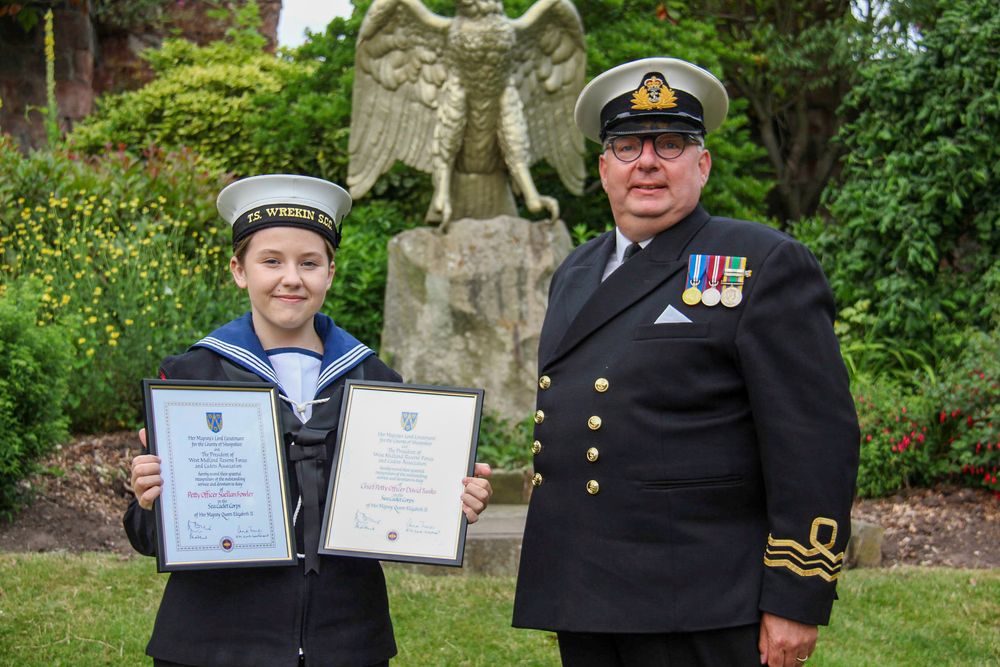 The outgoing Shropshire Lord-Lieutenant Sea Cadet and volunteer proudly hold their certificates