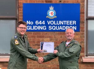 FS Baker receiving his certificate.