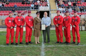 Red Devils, Robin Johnson and Lt Col Wallace-Phillips with signed Armed Forces Covenant.