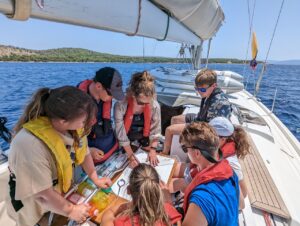 Students crewing on of the yachts.