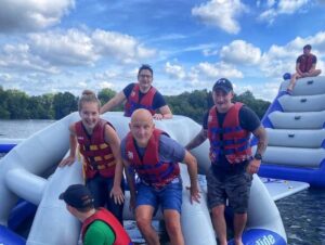 Personnel on inflatable water course.