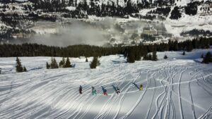 Aerial view of unit members skiing