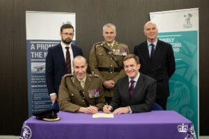 Members of the Council and local British Army with the signed Covenant.