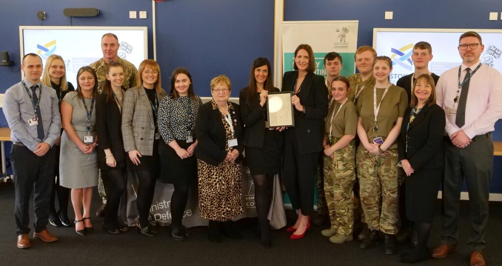 Group photograph with Bronze Award certificate.