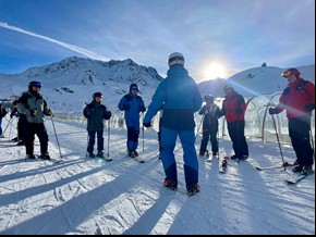 Personnel having a skiing lesson.